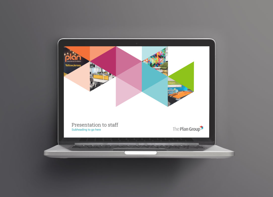 Laptop shows a template first page for The Plan Group company presentation. The design consists of tessellated triangles of colour and images