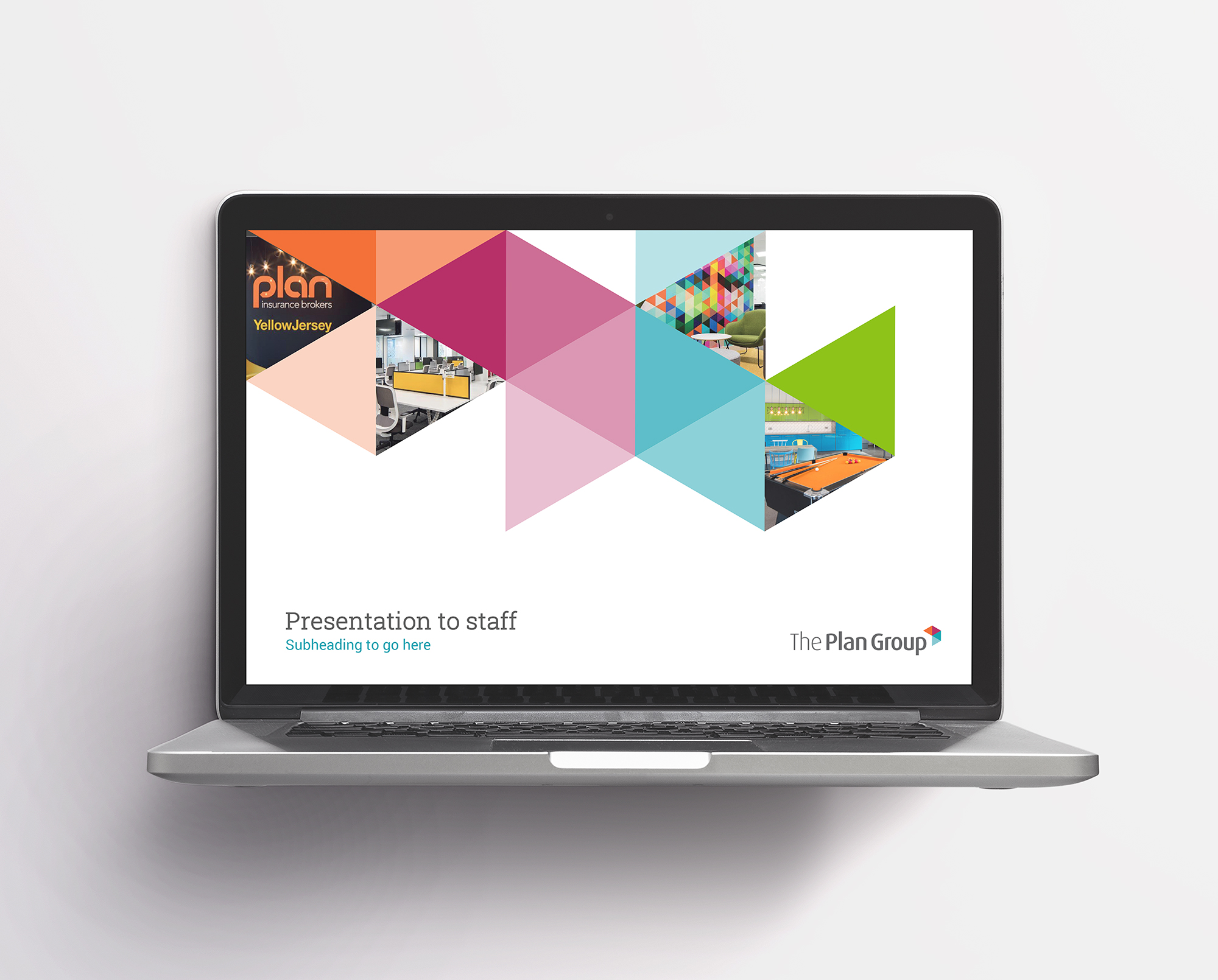 Laptop screen showing The Plan Group presentation template title slide. The design uses tesselated triangles with images and tints of the brand colours.